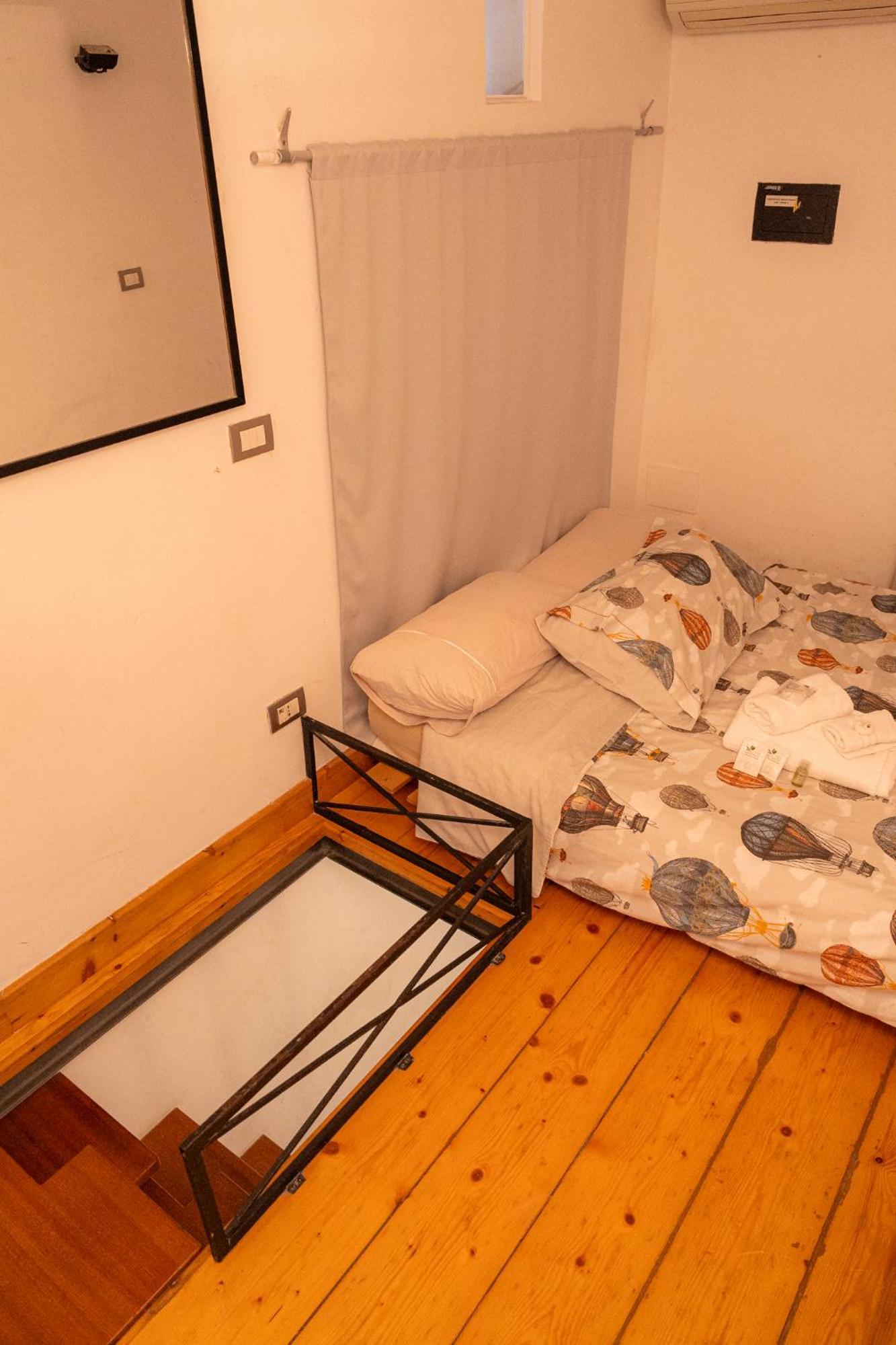 Homehouse Serpenti - Colosseum - Rione Monti ローマ 部屋 写真